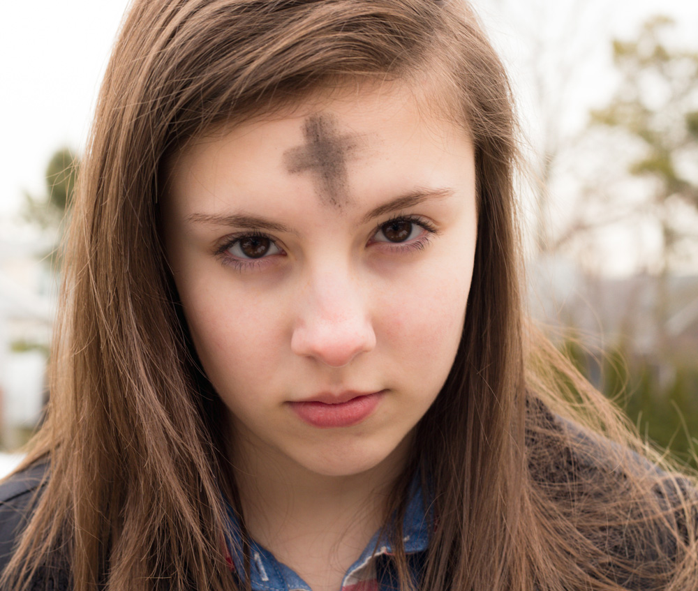 Ashes in the sign of the cross to mark Ash Wednesday and the start of Lent.